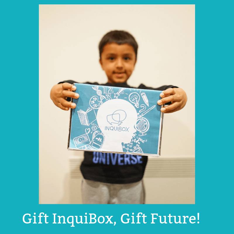 Boy holding InquiBox